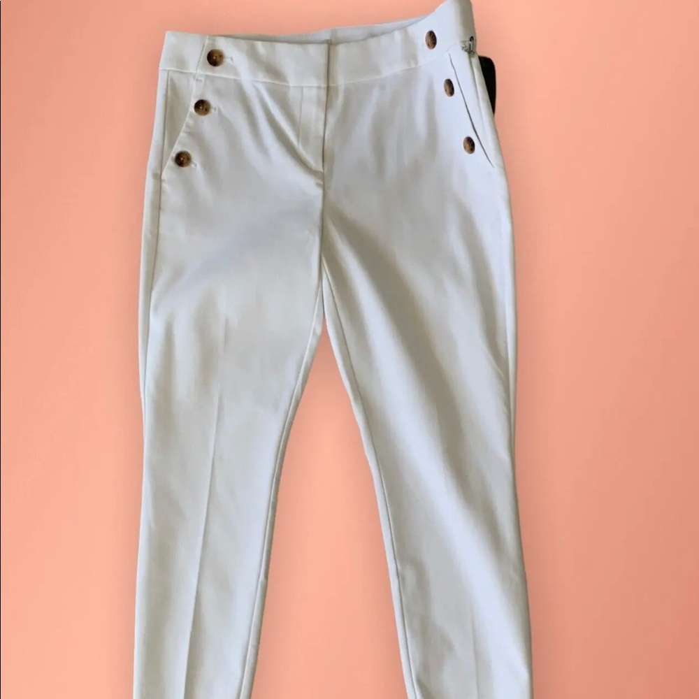 Loft size 00 skinny white pants. Never worn. Brand new without tags.